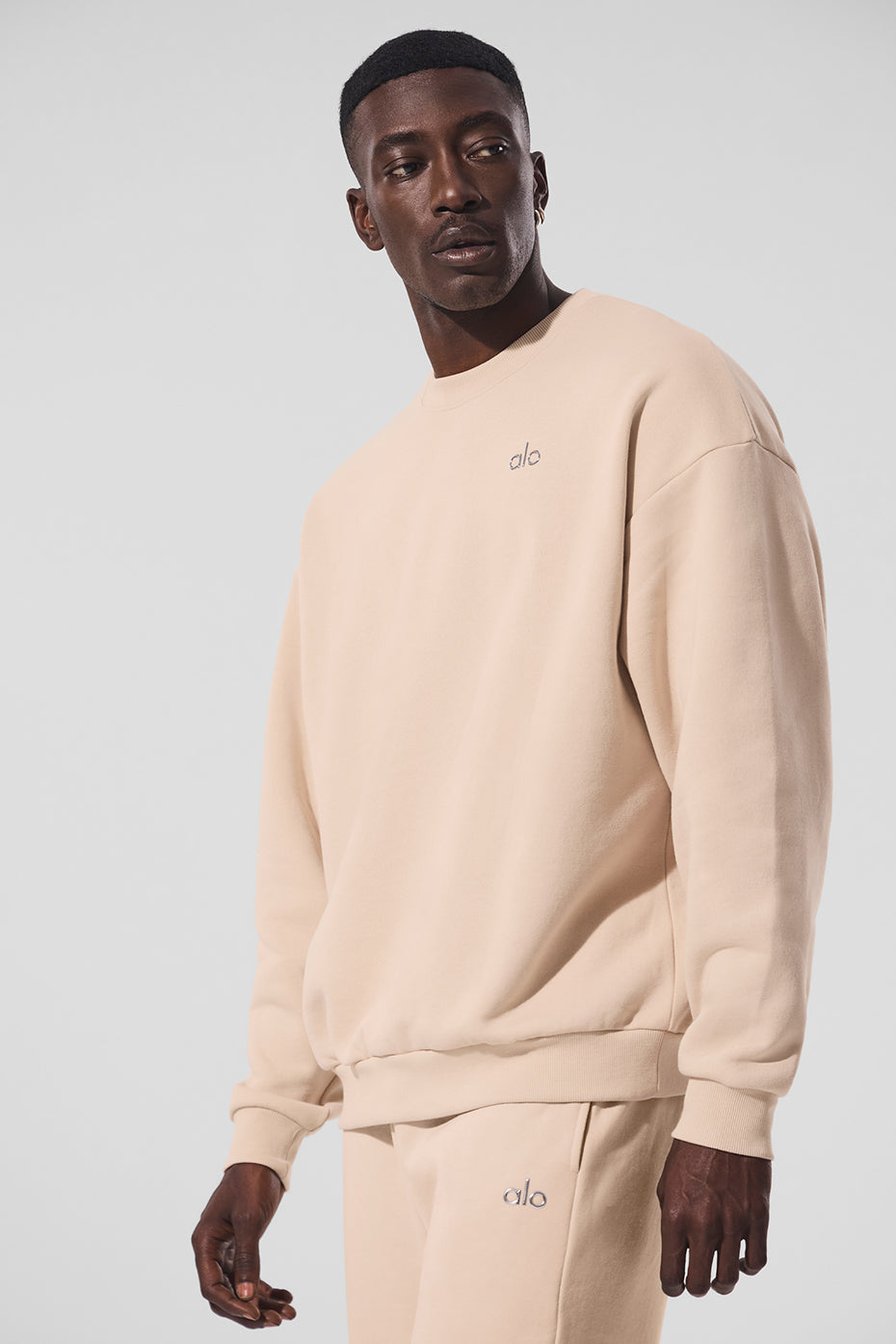 Front view of the Macadamia French terry crewneck sweatshirt with logo detail