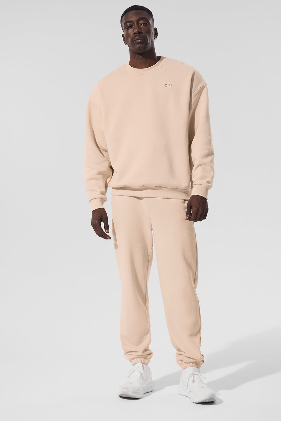 Front view of the Macadamia French terry crewneck sweatshirt with logo detail