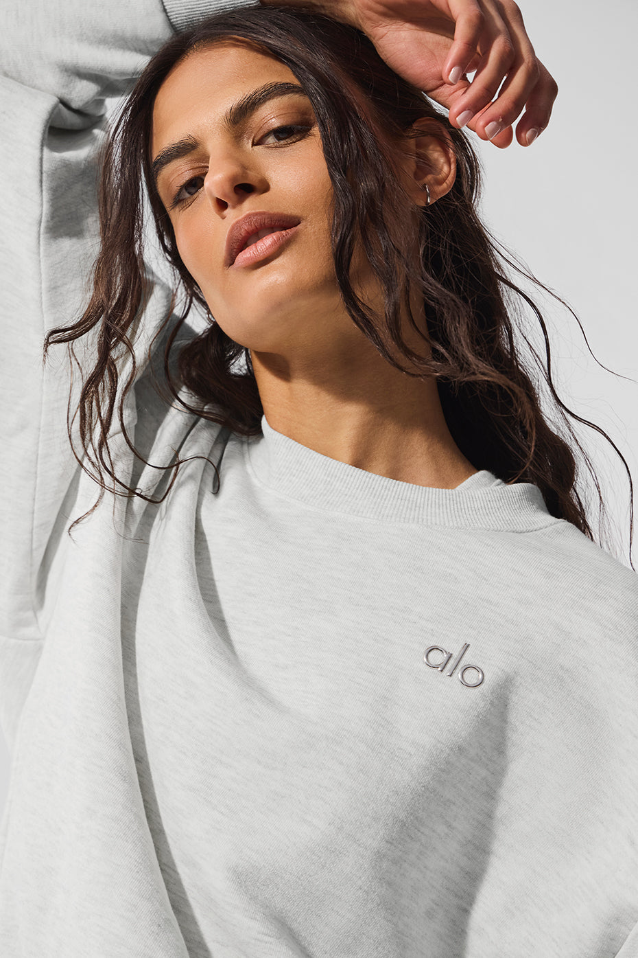 Model wearing the crew neck sweatshirt paired with casual jeans for a laid-back look