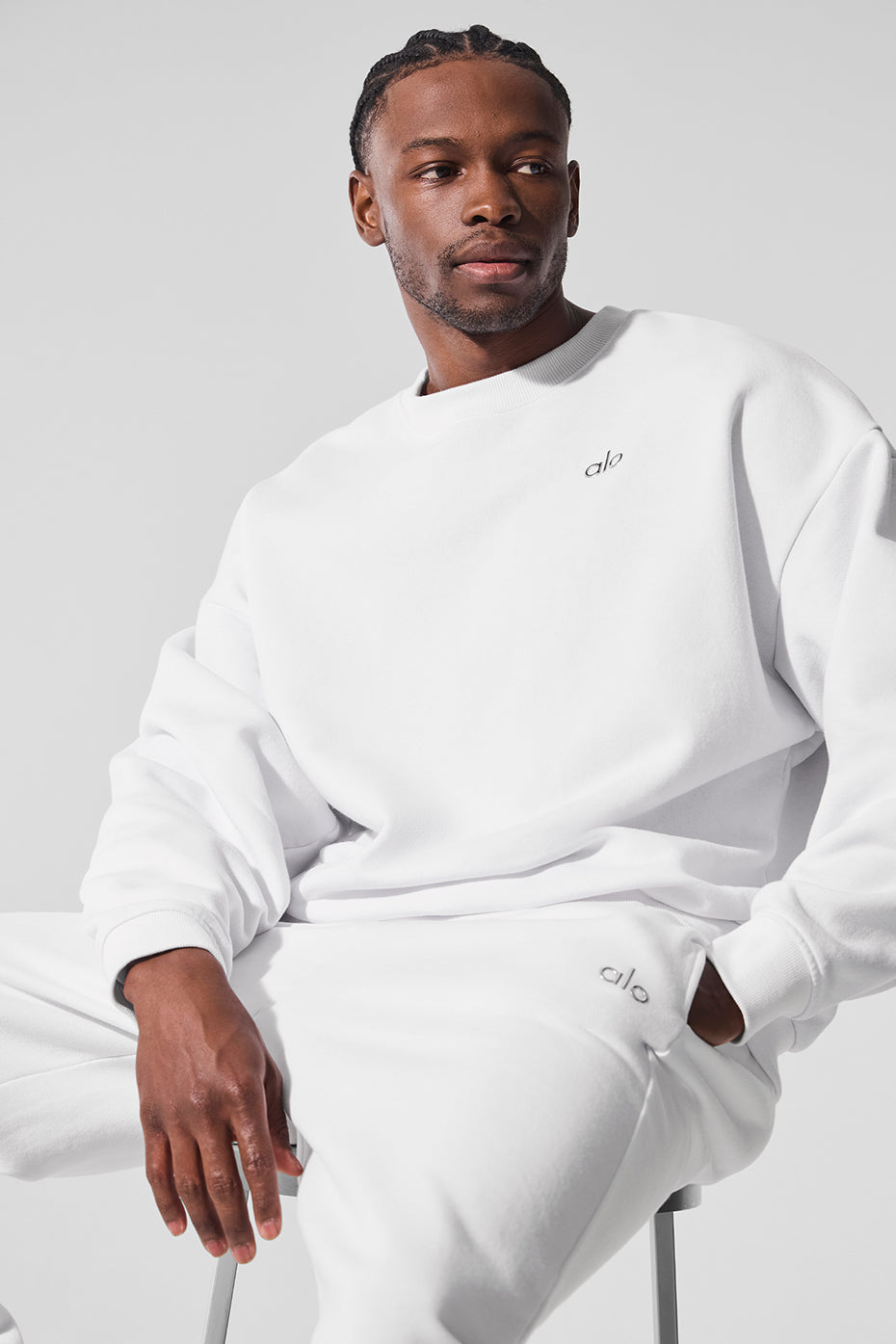 Front view of Accolade mens crewneck sweatshirt in white with logo.