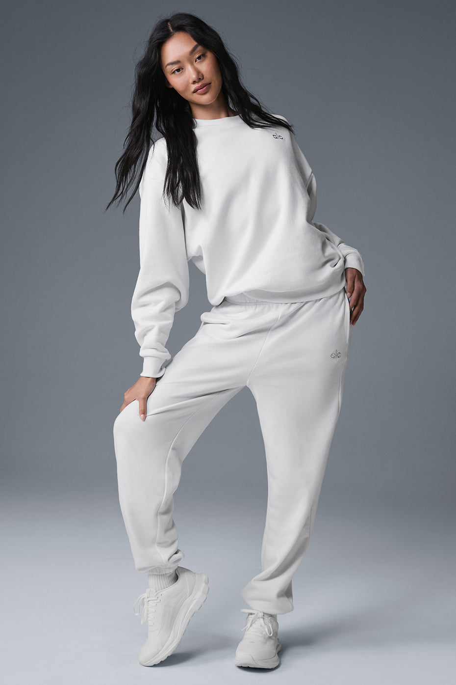Front view of the Accolade crew neck pullover in white, showcasing its relaxed fit.