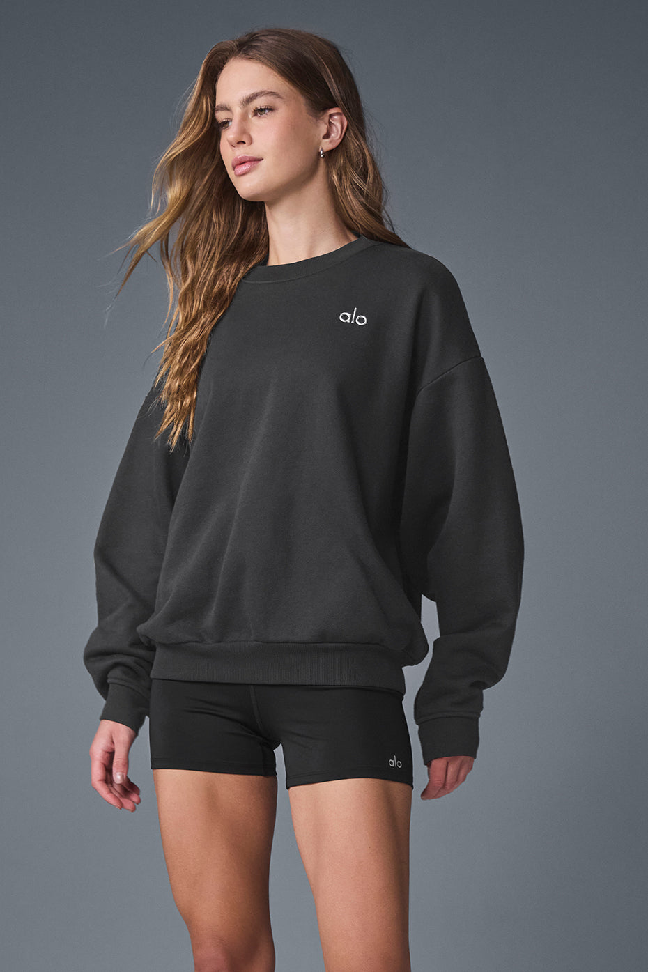 Front view of the Accolade crew neck sweatshirt in Anthracite showing ribbed cuffs and hem.