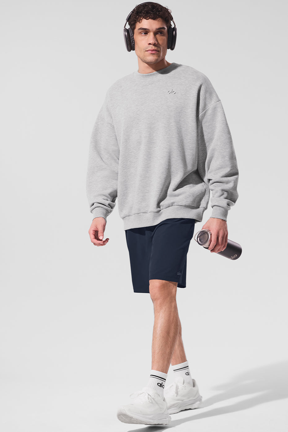 Front view of crew neck pullover styled with joggers—best for casual weekday wear.