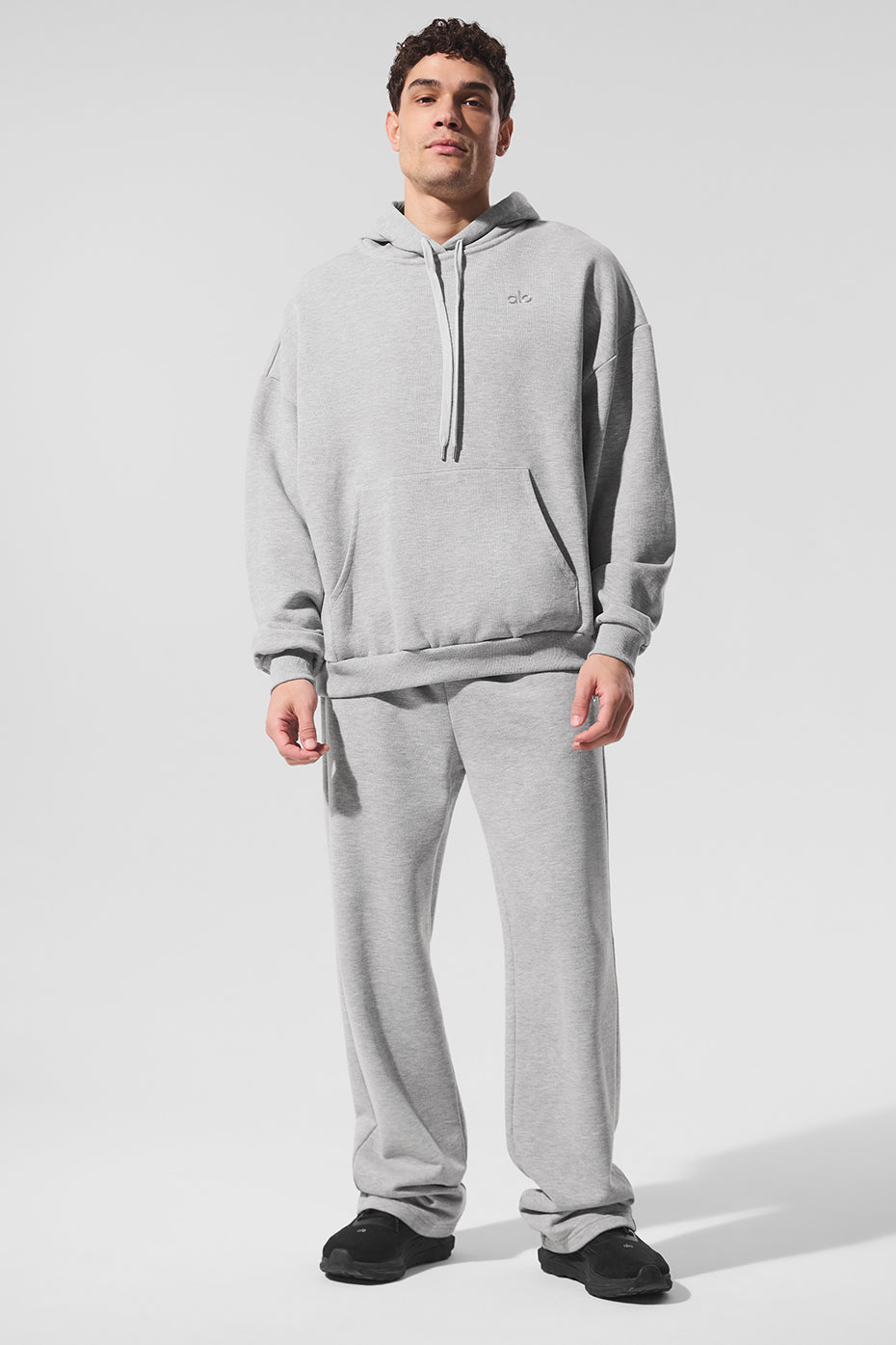 Front view of the comfort hoodie styled with joggers for casual city strolls