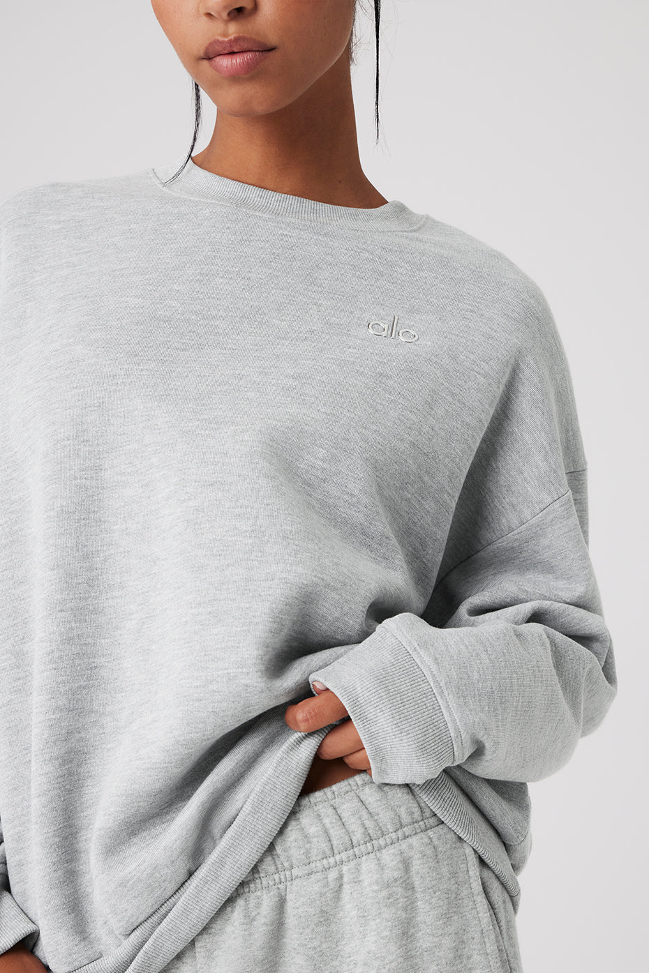 Close-up of the ribbed cuffs and dropped-shoulder design of the Accolade pullover.