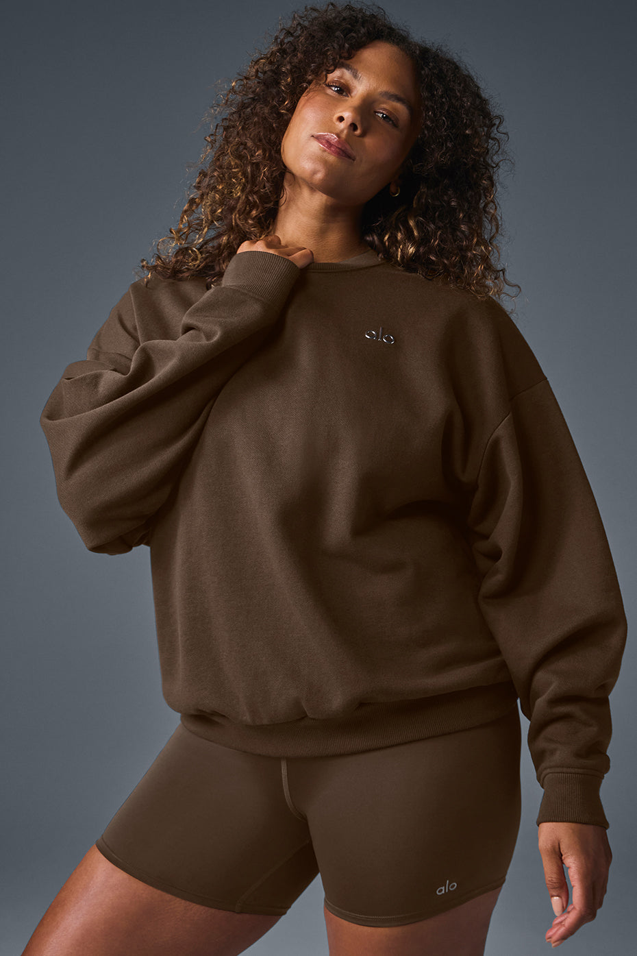 Back view of the casual mens pullover in a laid-back setting.