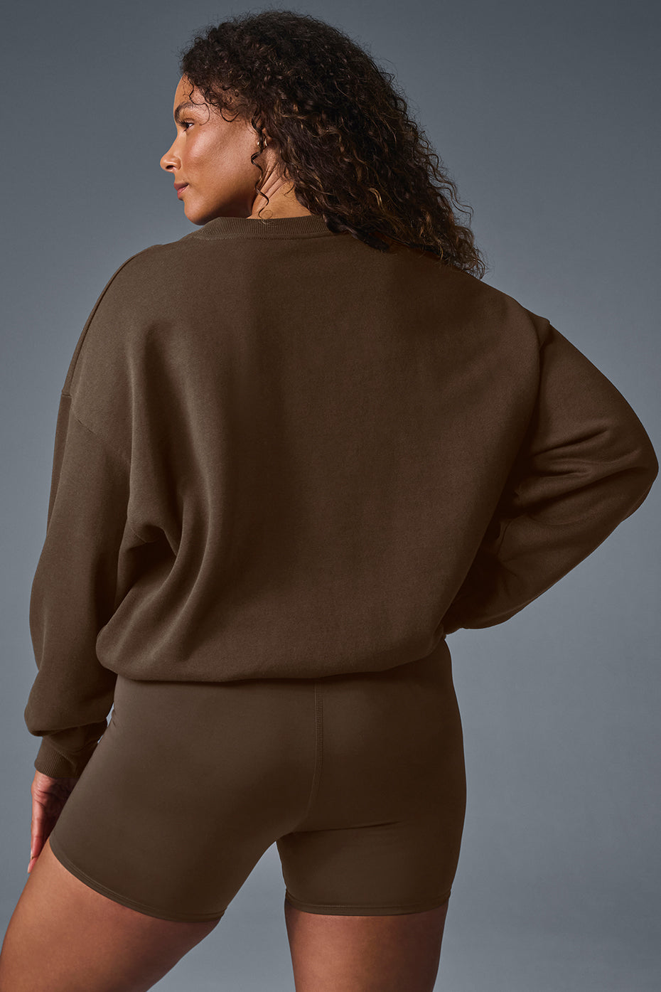 Front view of the black crew neck pullover perfect for casual wear.