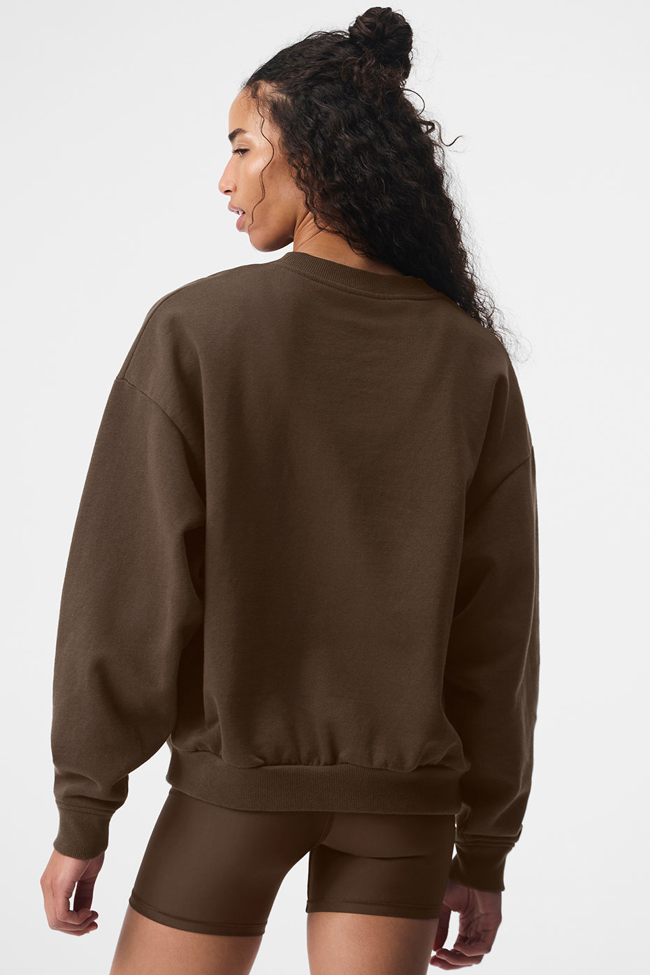 Back view of the casual mens pullover in a laid-back setting.