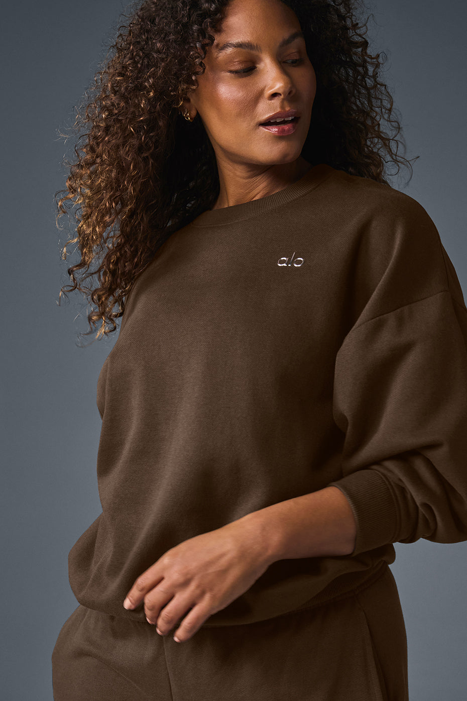 Side angle of the business casual pullover showcasing its ribbed cuffs.