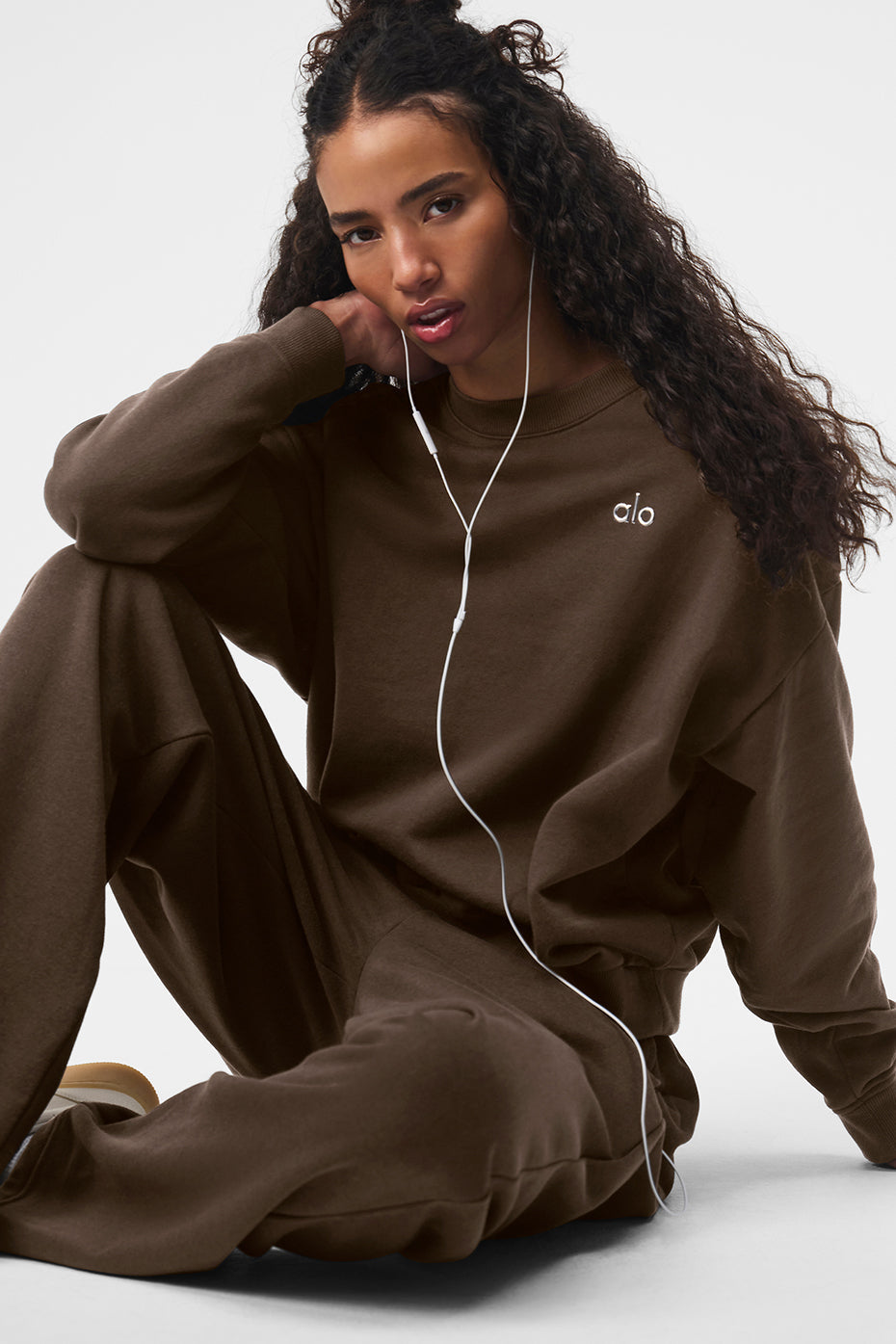 Front view of the black crew neck pullover perfect for casual wear.