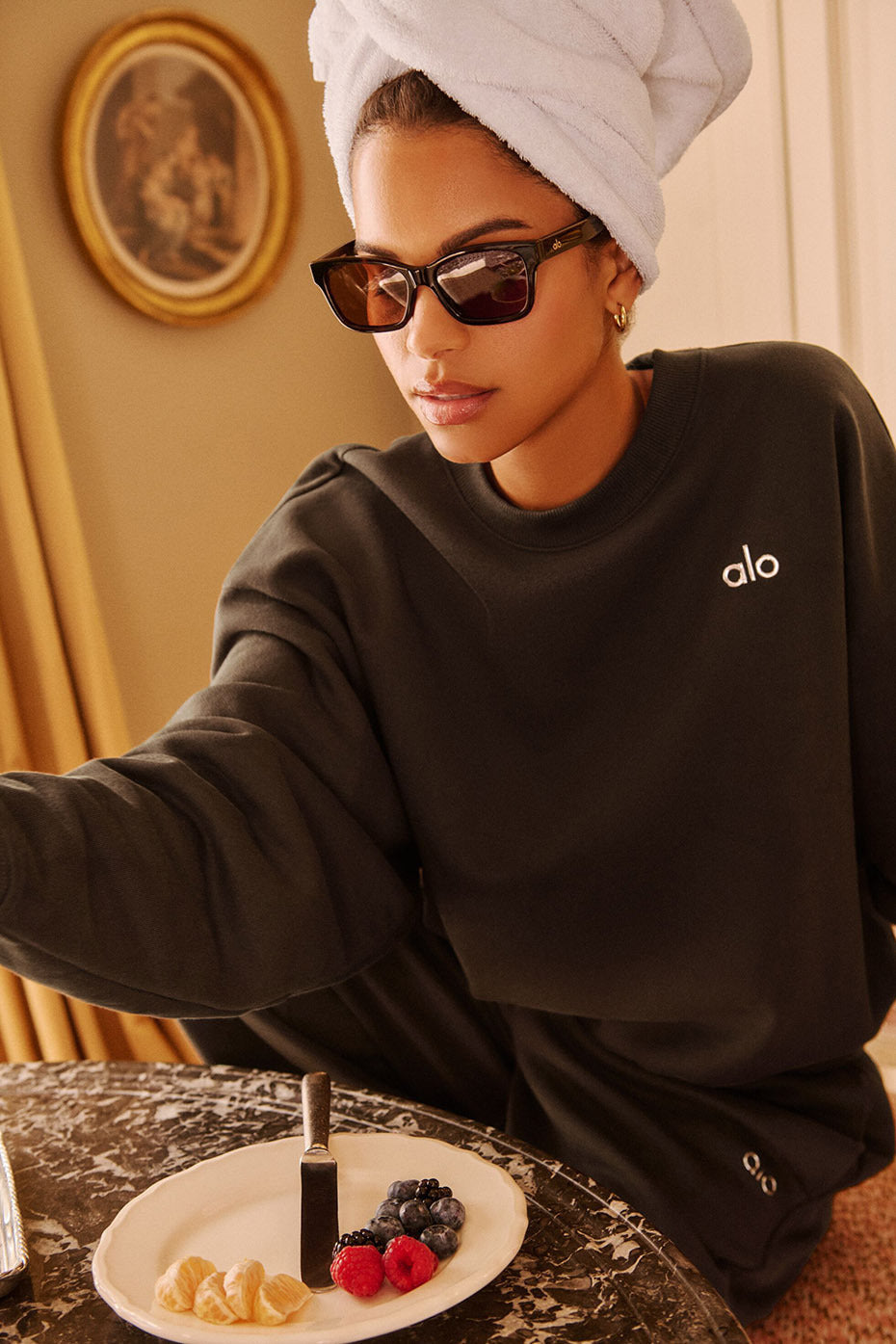 Front view of the black crew neck pullover perfect for casual wear.