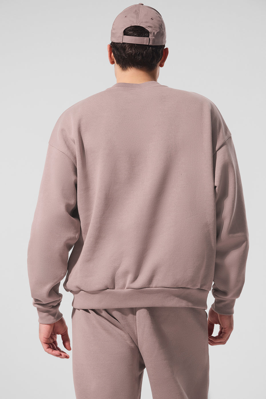 Close-up of the ribbed cuffs and hem on the crewneck pullover
