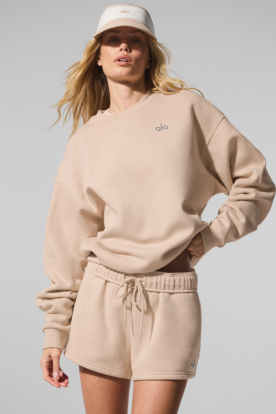 Front view of the cozy sweater on a hanger highlighting the ribbed cuffs and neckline