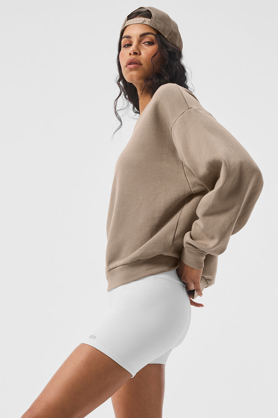 Model wearing the Accolade crew neck sweatshirt with matching sweatpants for a stylish look.