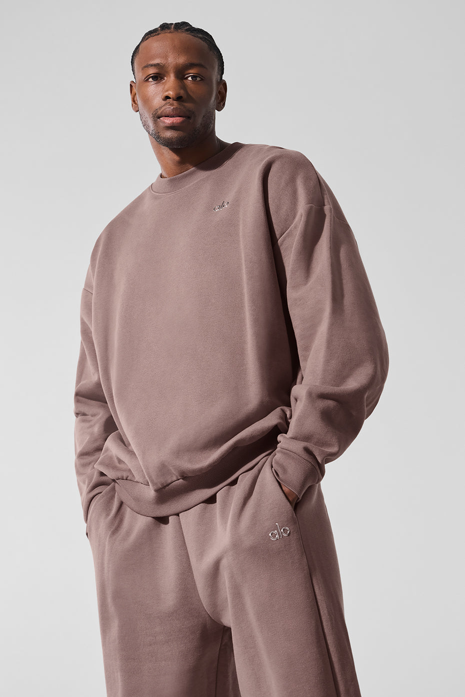 Front view of the Accolade crew neck pullover in mushroom color, showcasing its relaxed fit.