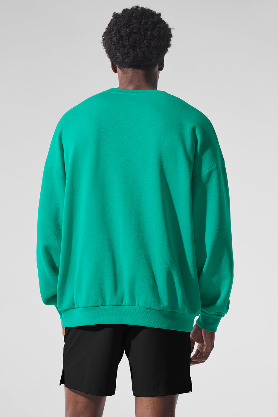 Close-up of the French terry sweatshirt fabric, showcasing its soft texture and quality.