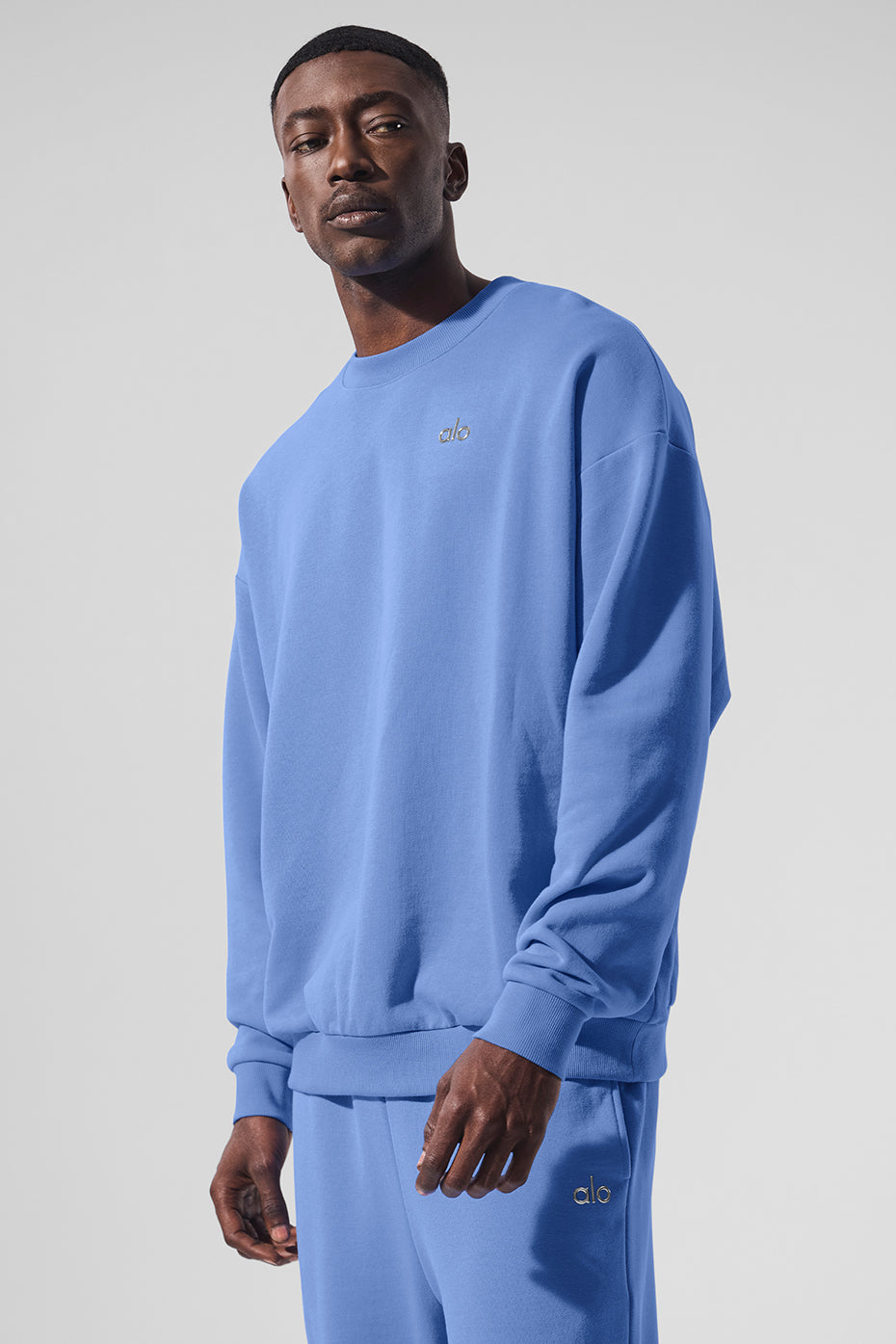 Front view of Accolade comfort colors sweatshirt in Crystal Clear Blue.