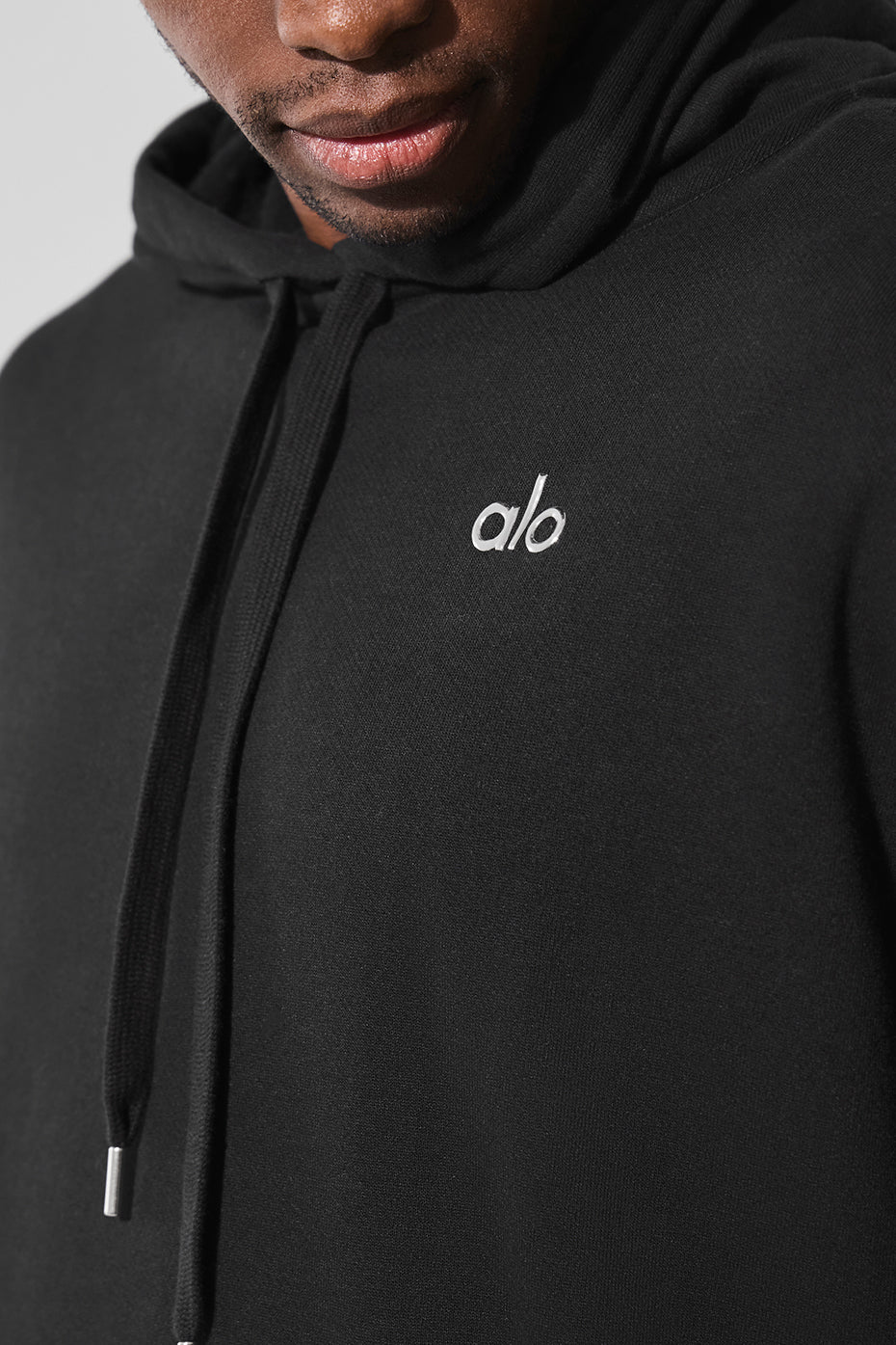 Front view of the Accolade black zip up hoodie highlighting its cozy design.