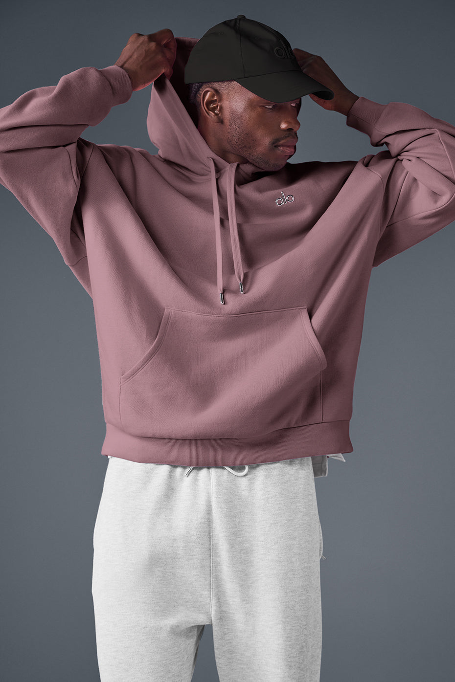 Model wearing the Accolade comfort hoodie, styled with matching sweatpants.