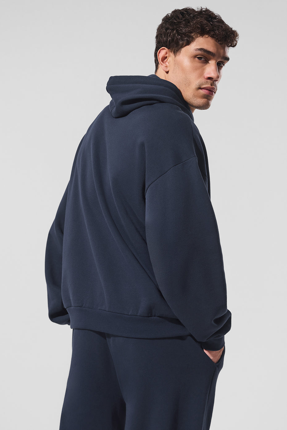 Close-up of kangaroo pocket and cuff ribbing on comfort hoodie