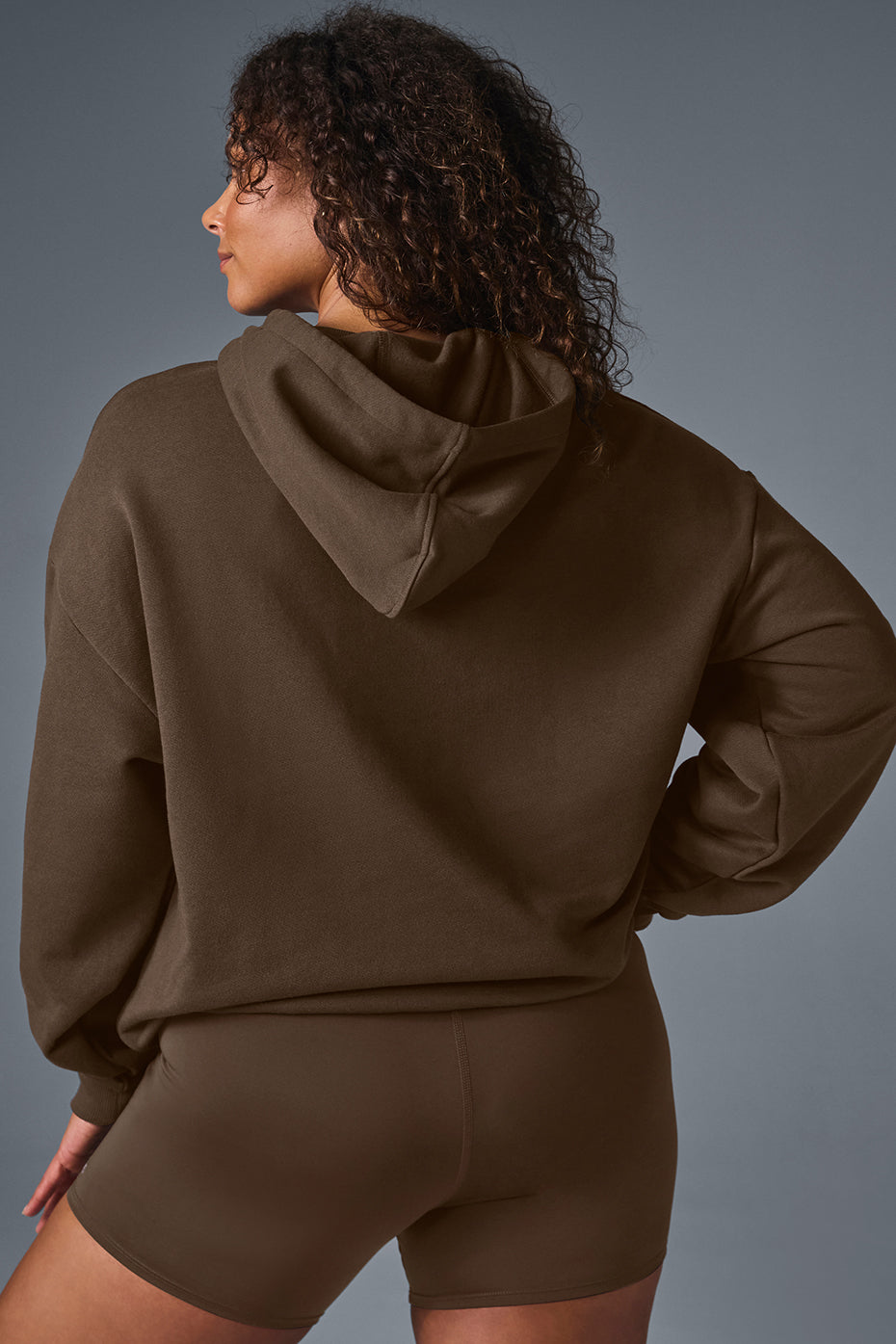 Parke comfort hoodie draped on a chair, showcasing its relaxed fit.