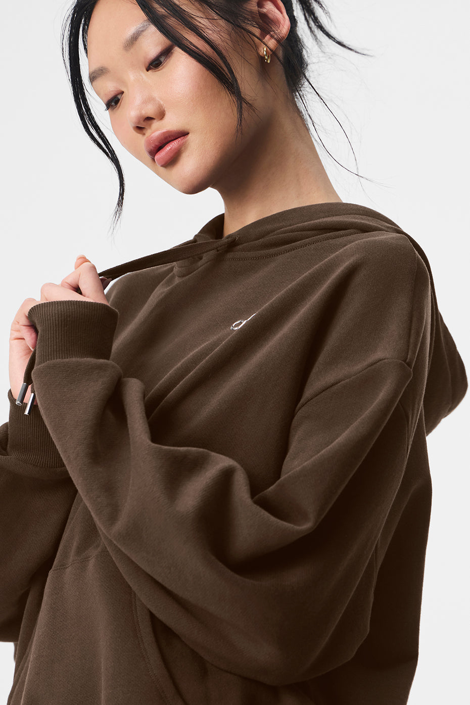 Parke comfort hoodie draped on a chair, showcasing its relaxed fit.