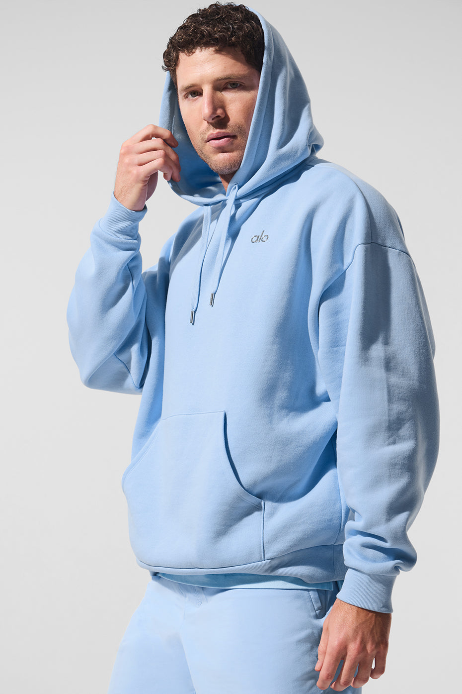 Close-up of Accolade Comfort Hoodie chrome logo detail