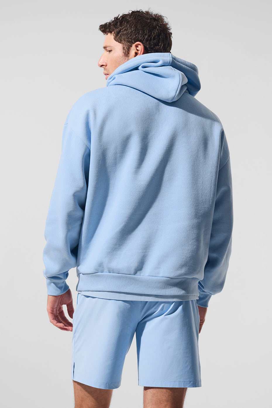 Close-up of Accolade Comfort Hoodie chrome logo detail
