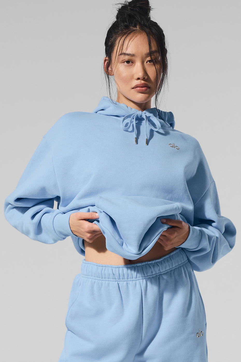Seashell blue comfort hoodie set styled with matching sweatpants.