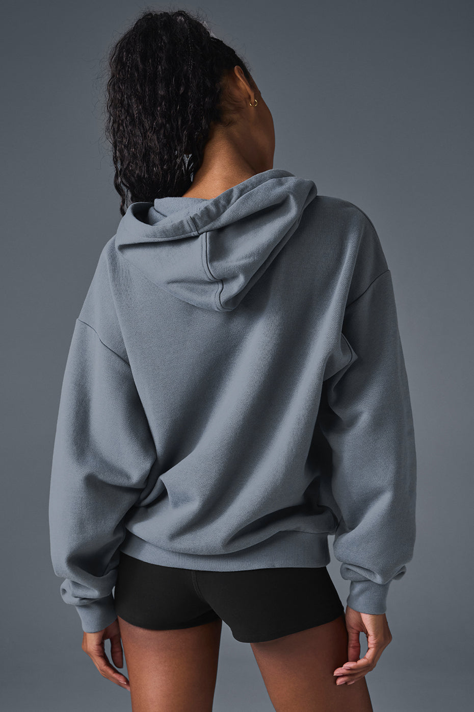 Model wearing the comfortable hoodie paired with matching sweatpants
