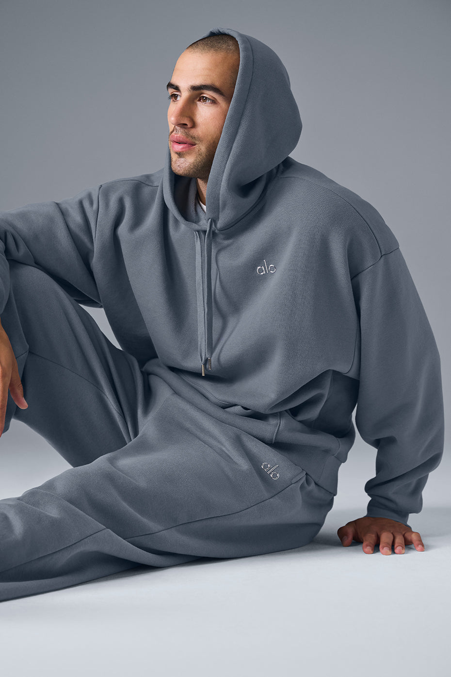 Back view of the Parke Comfort Hoodie, emphasizing the ribbed cuffs and hem.