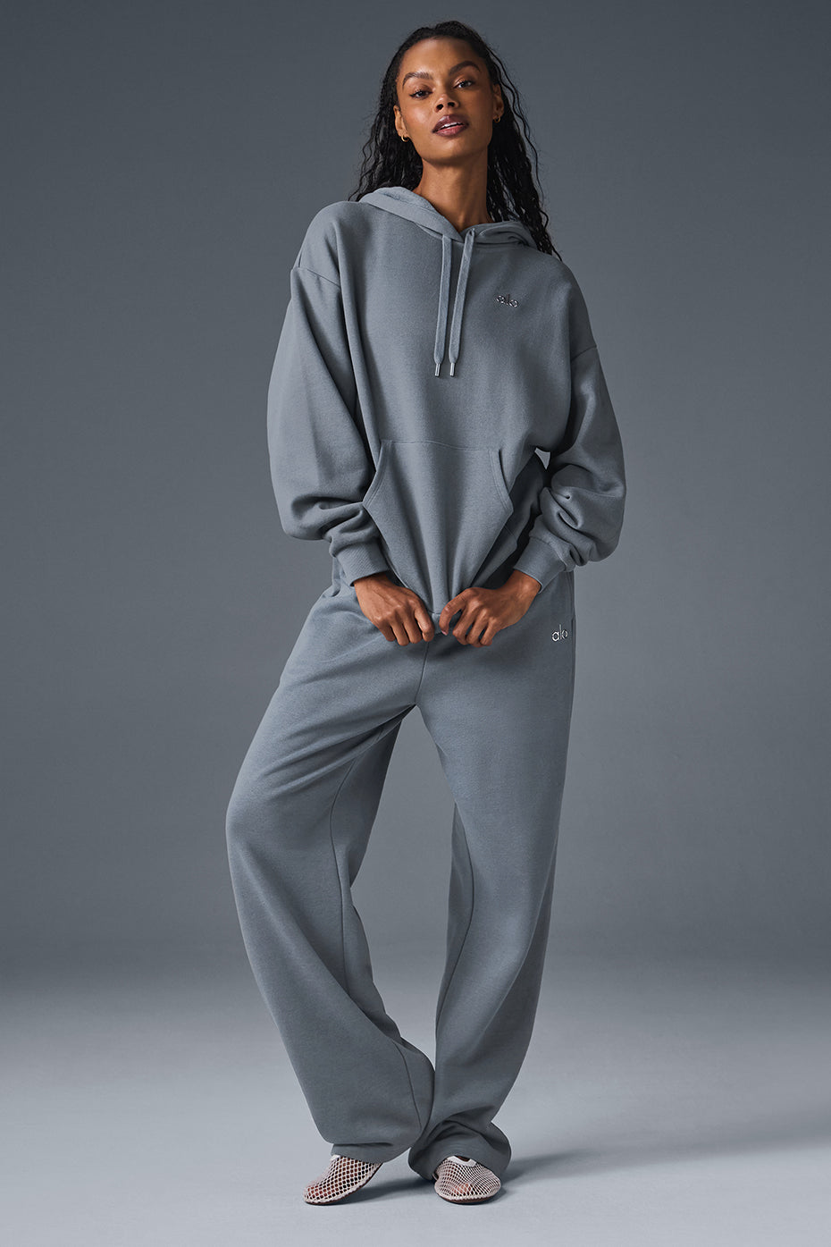 Model wearing the comfortable hoodie paired with matching sweatpants