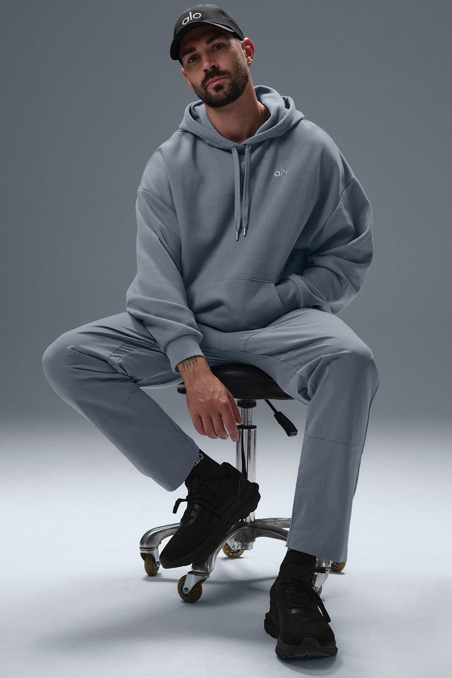Back view of the Parke Comfort Hoodie, emphasizing the ribbed cuffs and hem.