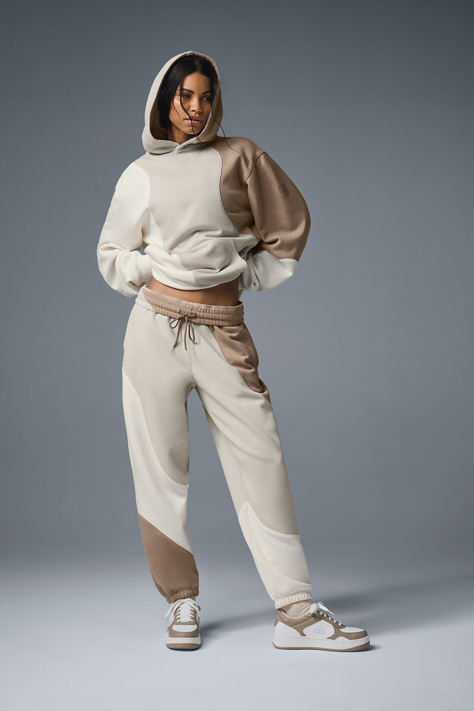 Close-up of the Wave Embrace oversized hoodie showcasing the seamed wave pattern.