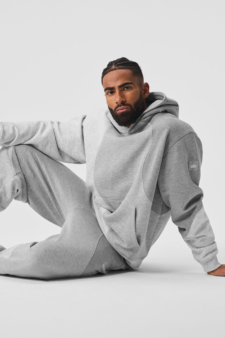 Close-up of the wave pattern detail on the Athletic Heather Grey hoodie.