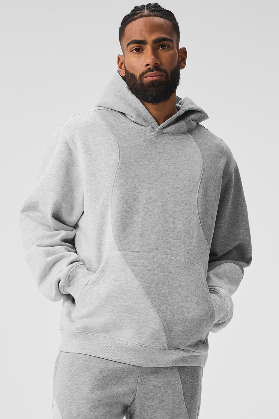 Model wearing the oversized zip-up hoodie, showcasing its relaxed fit.