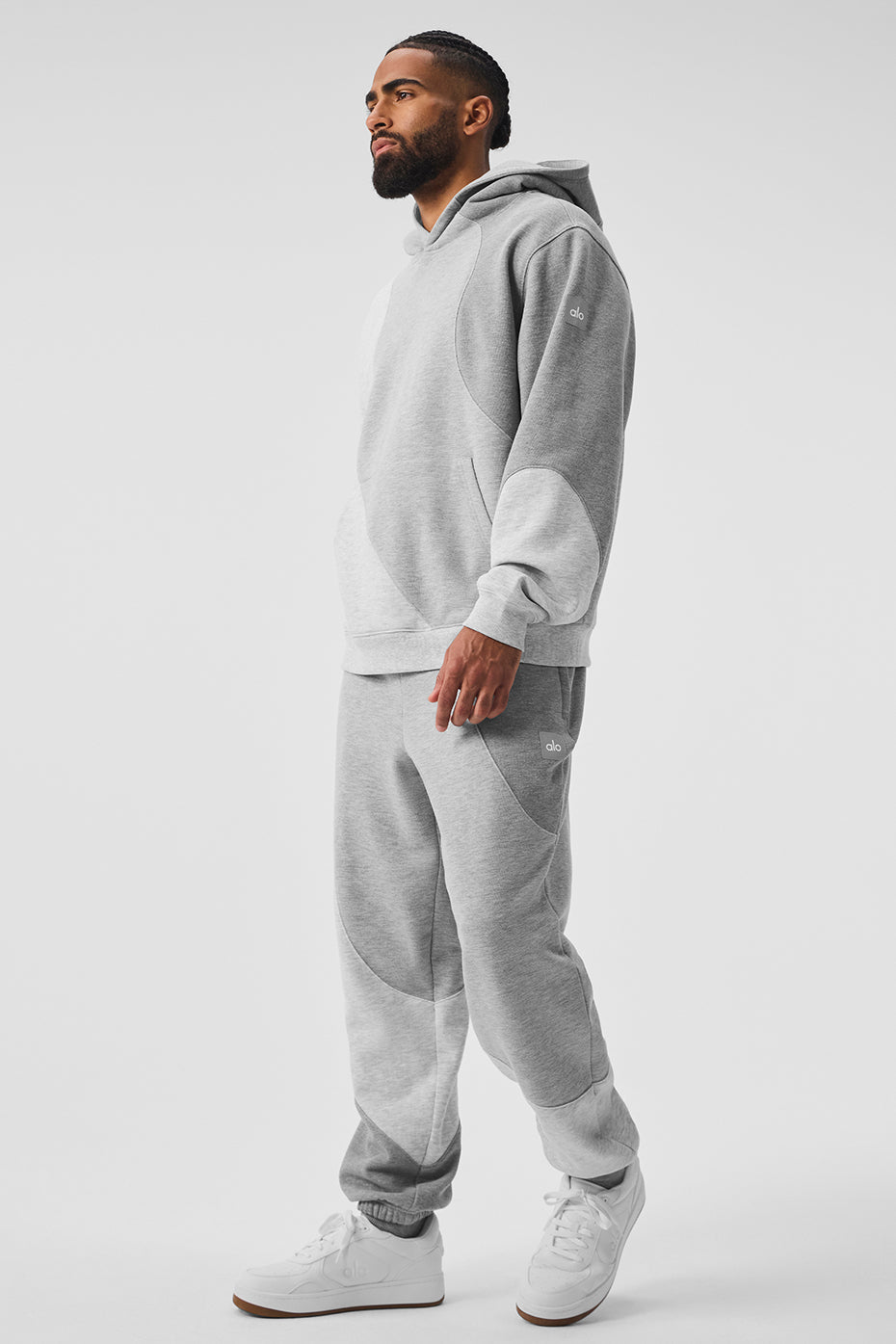 Model wearing the oversized zip-up hoodie, showcasing its relaxed fit.