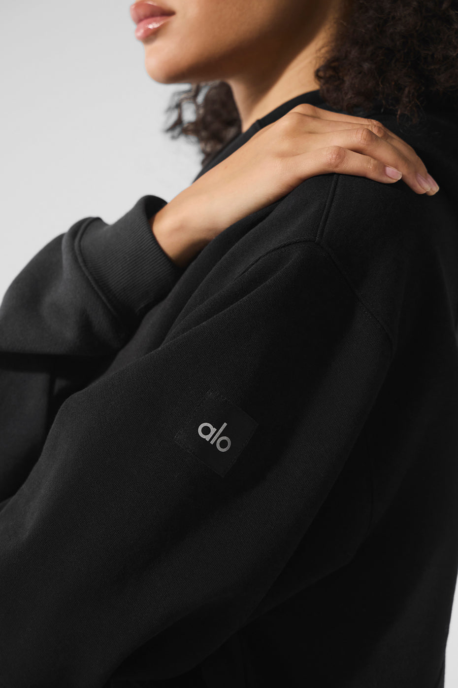 Front view of the vintage black hoodie showcasing its unique wave pattern.