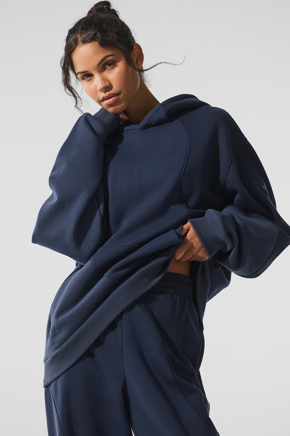 Side view of comfort hoodie showcasing relaxed fit and wave stitching
