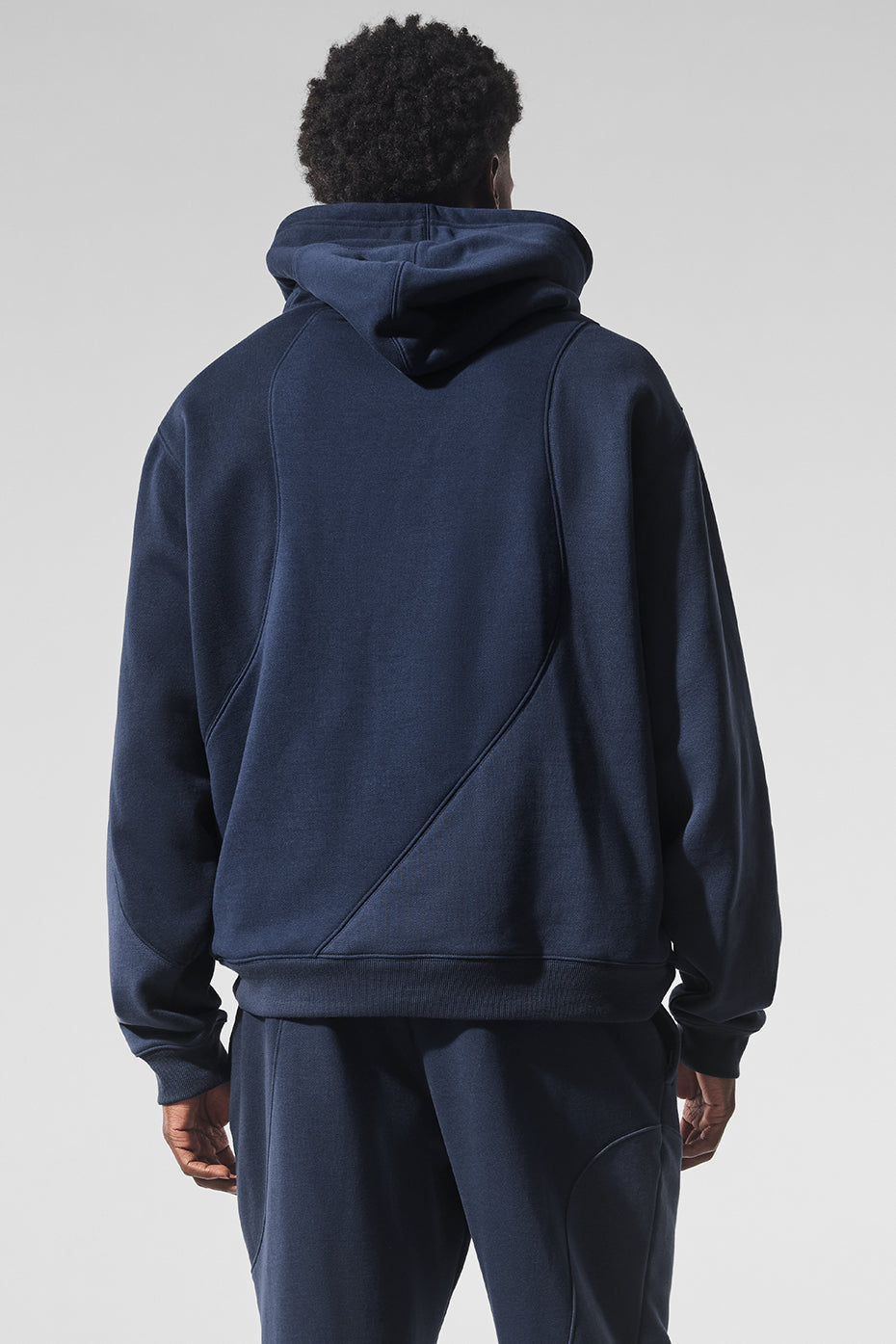 Model wearing the Make Waves oversized zip-up hoodie with relaxed fit