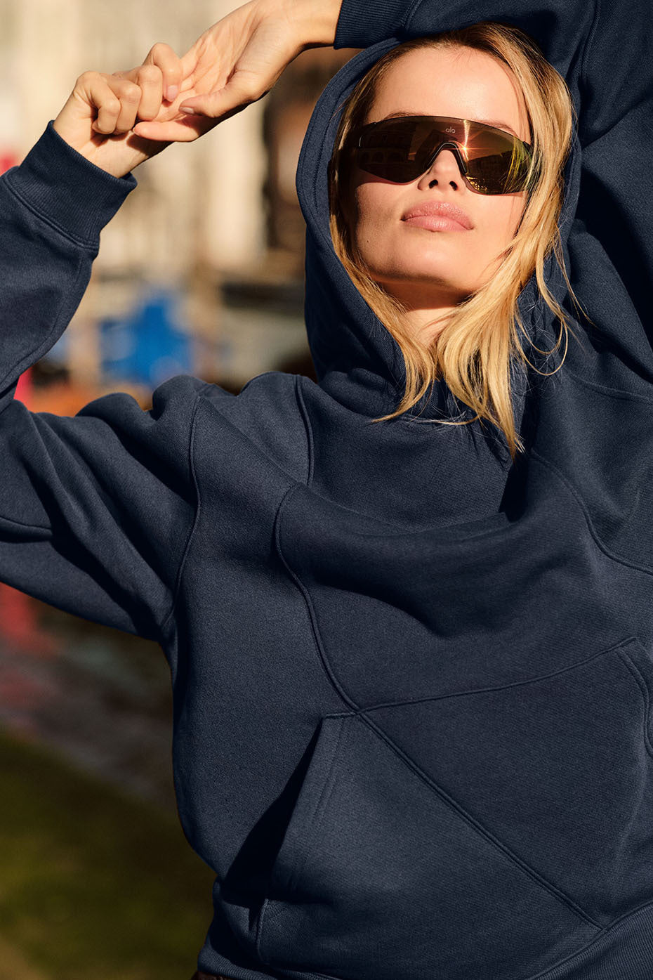 Close-up of navy oversized zip-up hoodie showing soft fabric texture