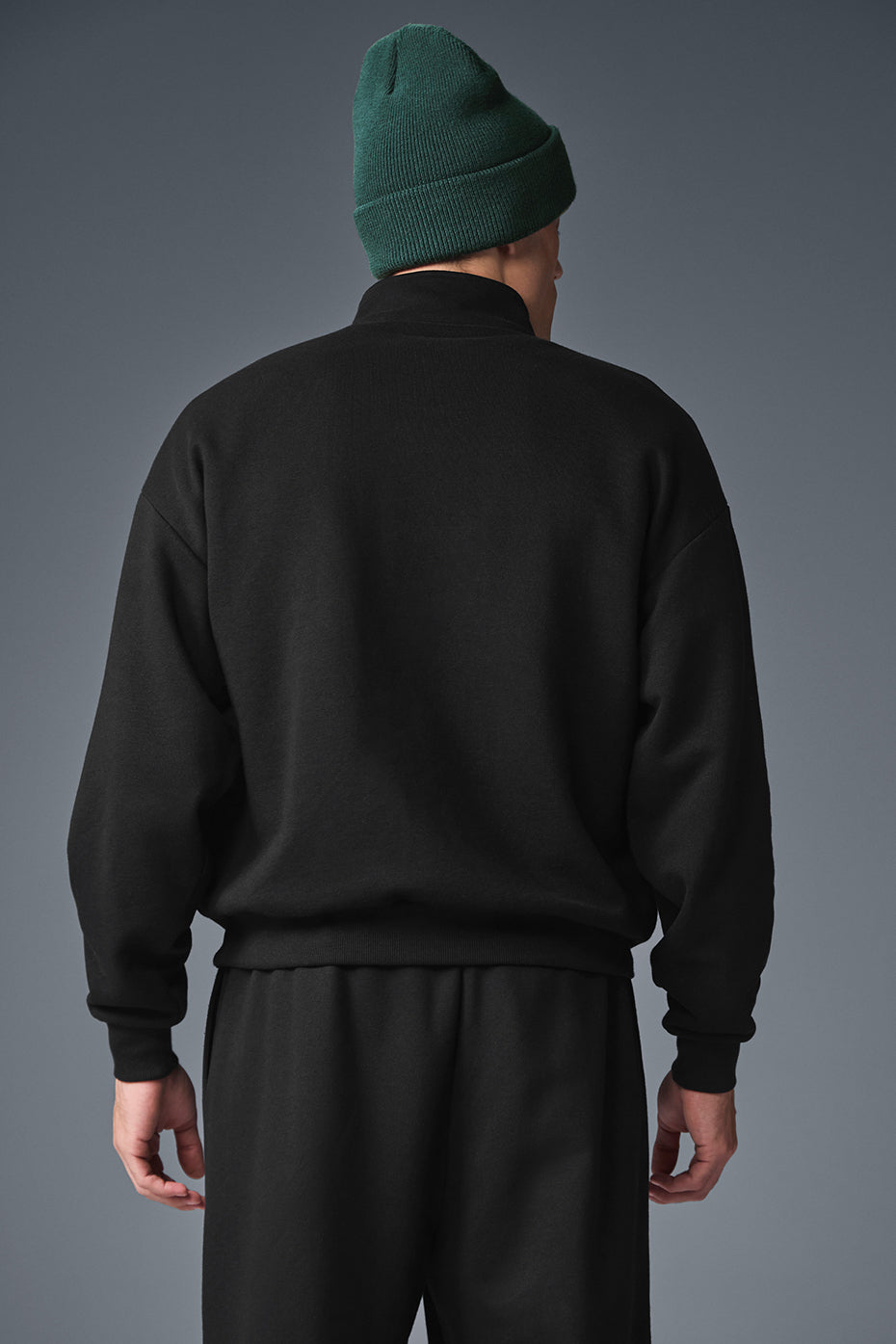 Stylish cashmere sweater worn casually for loungewear.