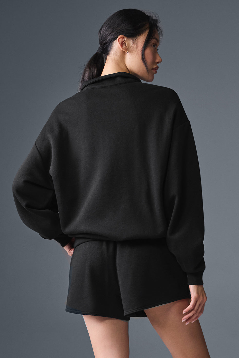 Closeup of 1 4 zip pullover sweatshirt collar and zipper details