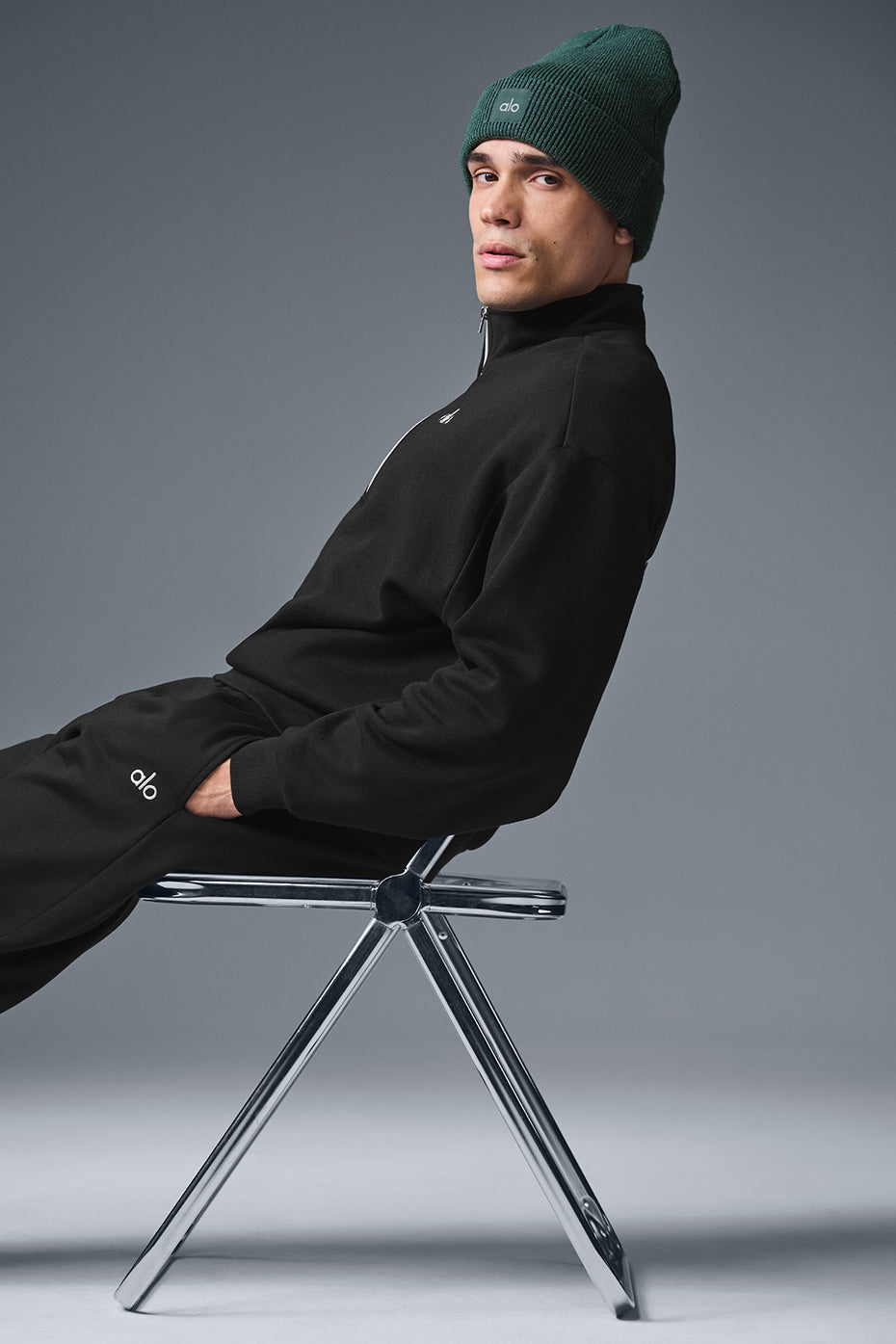 Close-up of the stand-up collar and zipper detail on the pullover.