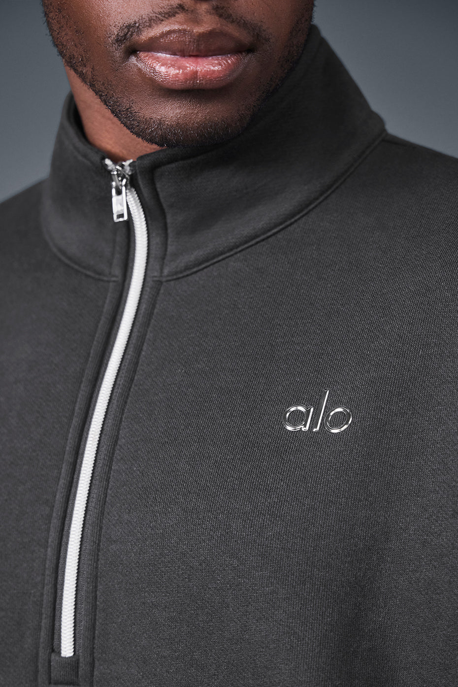 Front view of the Accolade pullover highlighting the 1/4 zip and collar design