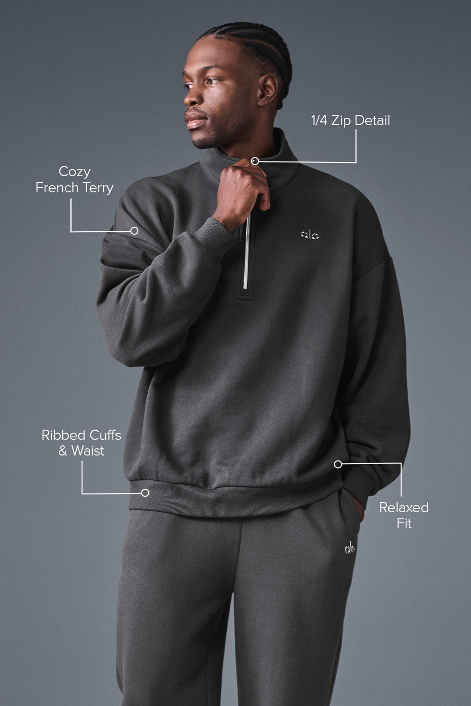 Model wearing the anthracite pullover in a relaxed setting, perfect for loungewear