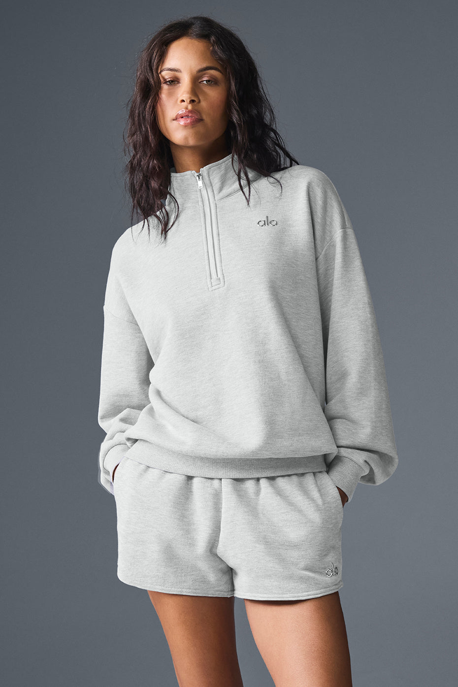 Pullover folded neatly with other loungewear sets ready for weekend packing
