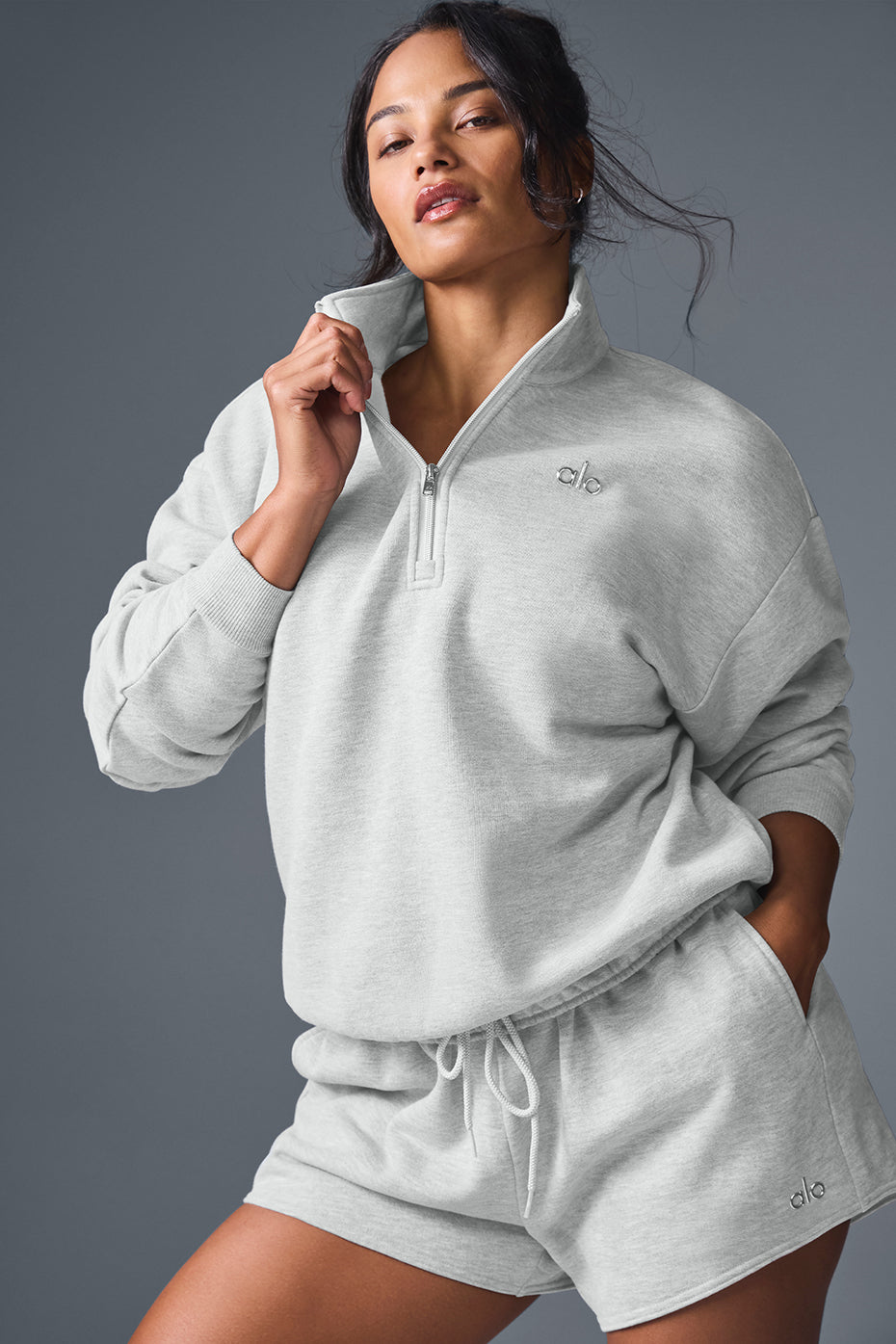 Pullover folded neatly with other loungewear sets ready for weekend packing