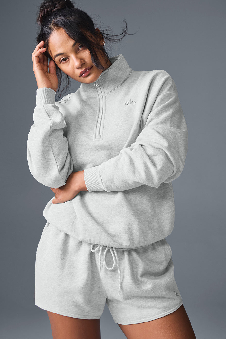 Pullover folded neatly with other loungewear sets ready for weekend packing