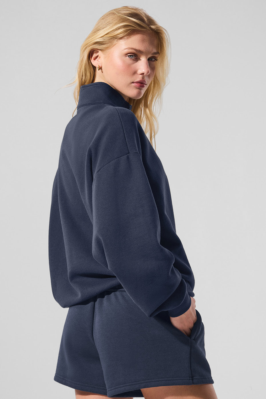 Casual setting featuring the navy pullover, ideal for loungewear.